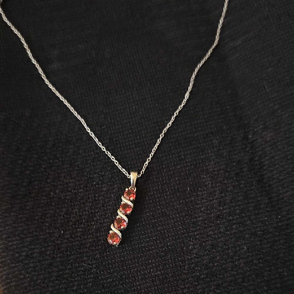 Elegant Silver Necklace with Red Gemstones